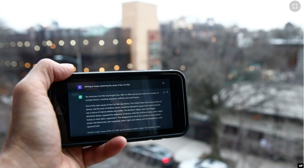 A ChatGPT prompt is shown on a device near a public school in Brooklyn, New York, Thursday, Jan. 5, 2023. (AP Photo/Peter Morgan)