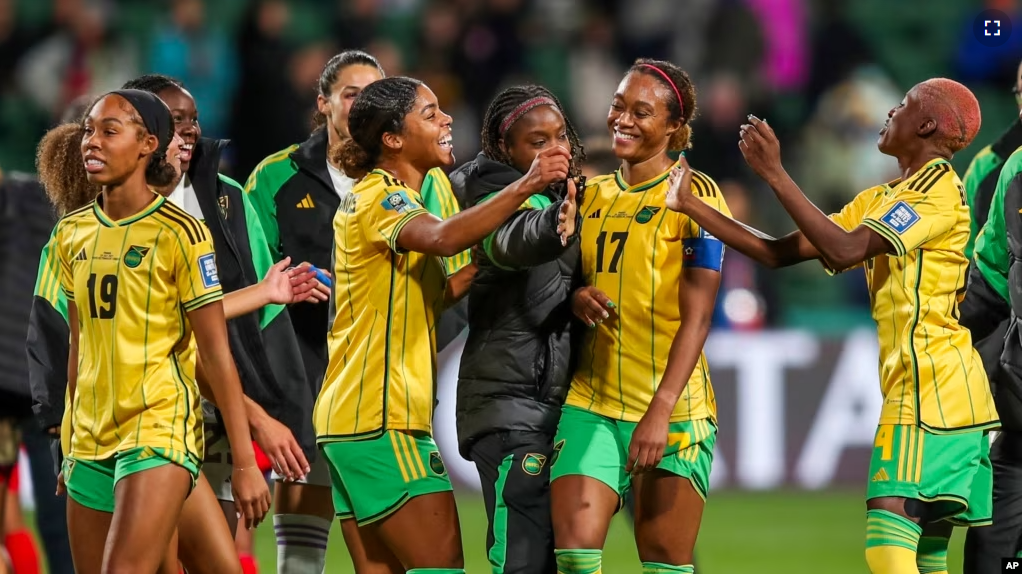 FILE - Jamaican players celebrate at the end of the Women's World Cup soccer match between Panama and Jamaica in Perth, Australia, Saturday, July 29, 2023. Jamaica won 1-0. (AP Photo/Gary Day)