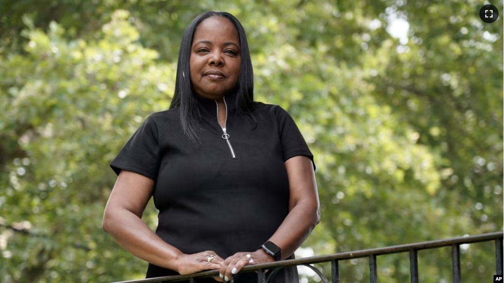 Philadelphia school district teacher Rhonda Hicks poses for a portrait at her home in Philadelphia, Thursday, July 20, 2023. (AP Photo/Michael Perez)