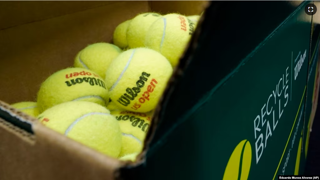 A box of game-used tennis balls are packed in a recycling box during the U.S. Open tennis championships, Monday, Sept. 4, 2023, in New York. AP Photo/Eduardo Munoz Alvarez)