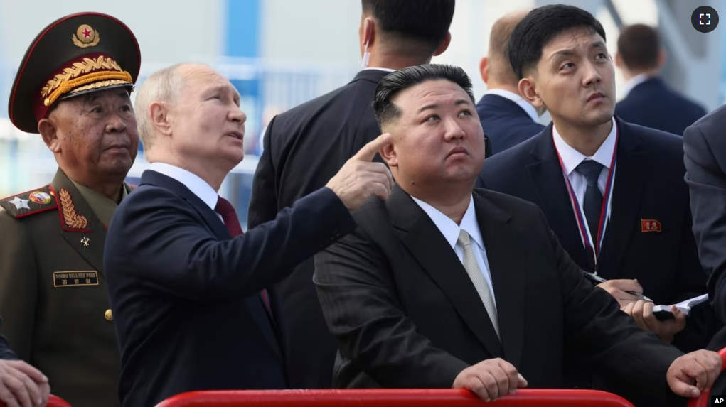 Russian President Vladimir Putin and North Korea's leader Kim Jong Un examine a launch pad during their meeting at the Vostochny cosmodrome outside the city of Tsiolkovsky, on Wednesday, Sept. 13, 2023. (Mikhail Metzel, Sputnik, Kremlin Pool Photo via AP)