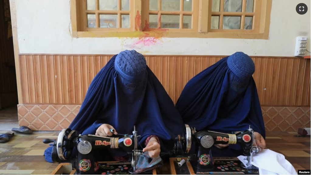 Afghan women attend tailoring class at the Skills Academy for Needy Aspirants (SANA) in Peshawar, Pakistan July 13, 2023. (REUTERS/Fayaz Aziz)