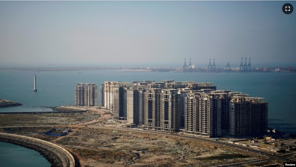 FILE PHOTO: An aerial view shows the 39 buildings developed by China Evergrande Group that authorities have issued demolition order, on the man-made Ocean Flower Island in Danzhou, Hainan province, China January 6, 2022. (REUTERS/Aly Song/File Photo/File Photo)