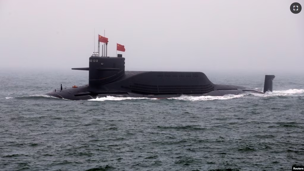 FILE - Chinese Navy's nuclear-powered submarine Long March 11 takes part in a naval parade off the eastern port city of Qingdao, China on April 23, 2019. (REUTERS/Jason Lee)