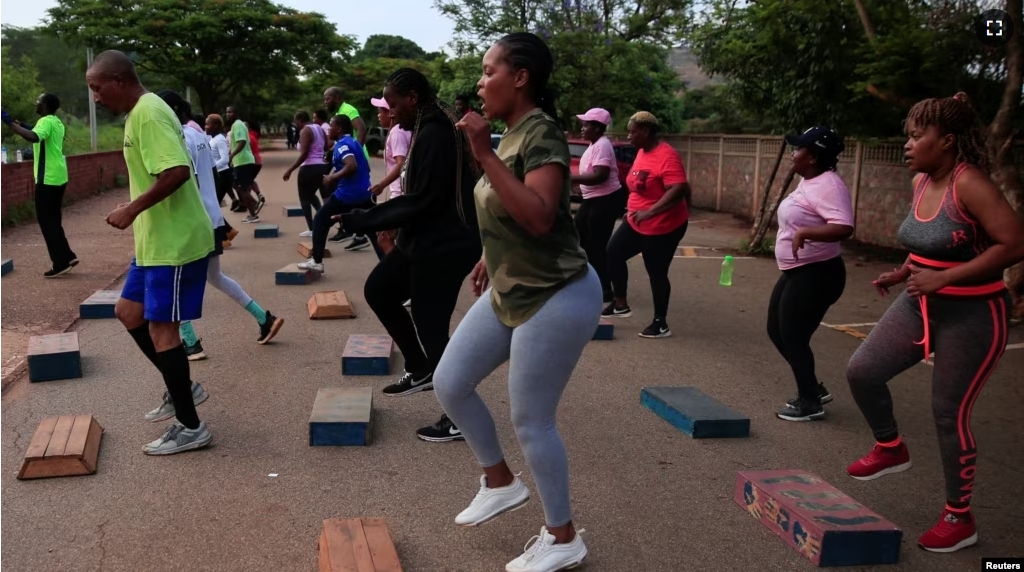 FILE - People exercise inside Warren Hills cemetery in Harare, Zimbabwe, November 24 ,2022. (REUTERS/Philimon Bulawayo)