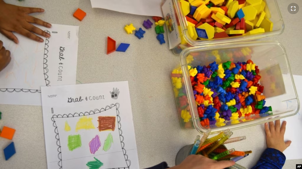 Preschool students practice math using manipulatives at a public school in Boston in 2016. (Lillian Mongeau/The Hechinger Report via AP)