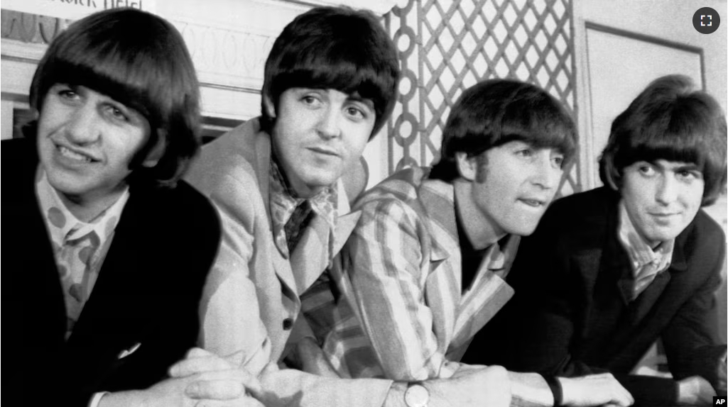 FILE - In this Aug. 23, 1966 file photo, The Beatles, from left, Ringo Starr; Paul McCartney; John Lennon; and George Harrison appear at a press conference in New York. (AP Photo)