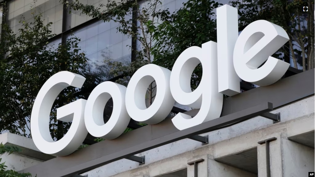 The Google sign is shown over an entrance to the company's new building in New York on Wednesday, Sept. 6, 2023.