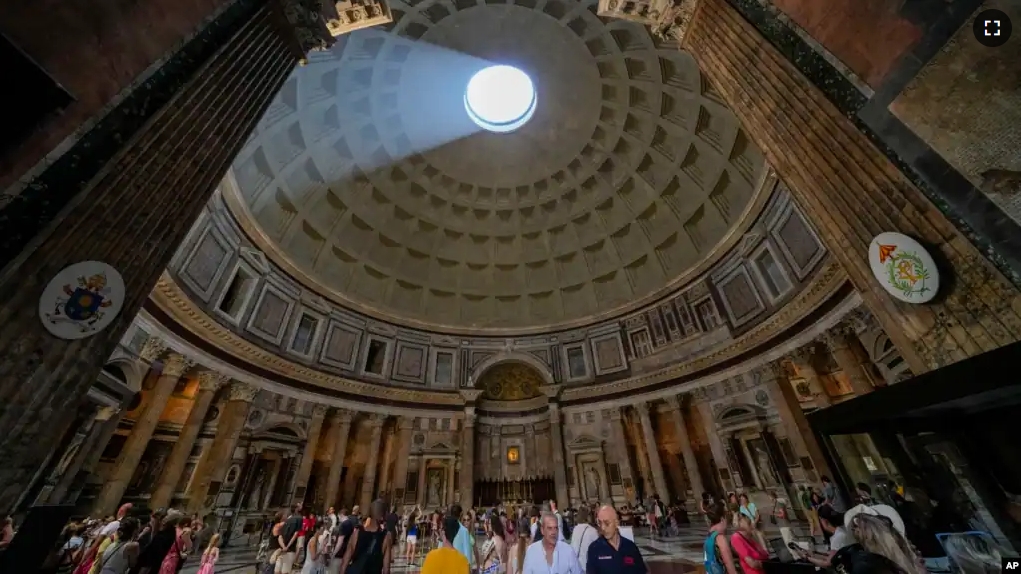 Visitors tour the interior of the Pantheon's dome in Rome, Thursday, Aug. 24, 2023. (AP Photo/Andrew Medichini)