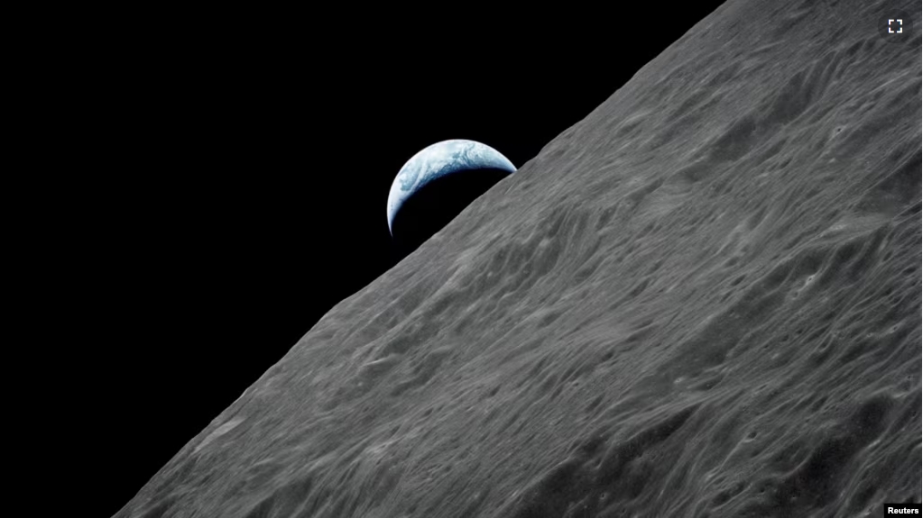 The Crescent Earth Rises Above The Lunar Horizon In This Undated NASA Handout Photograph 