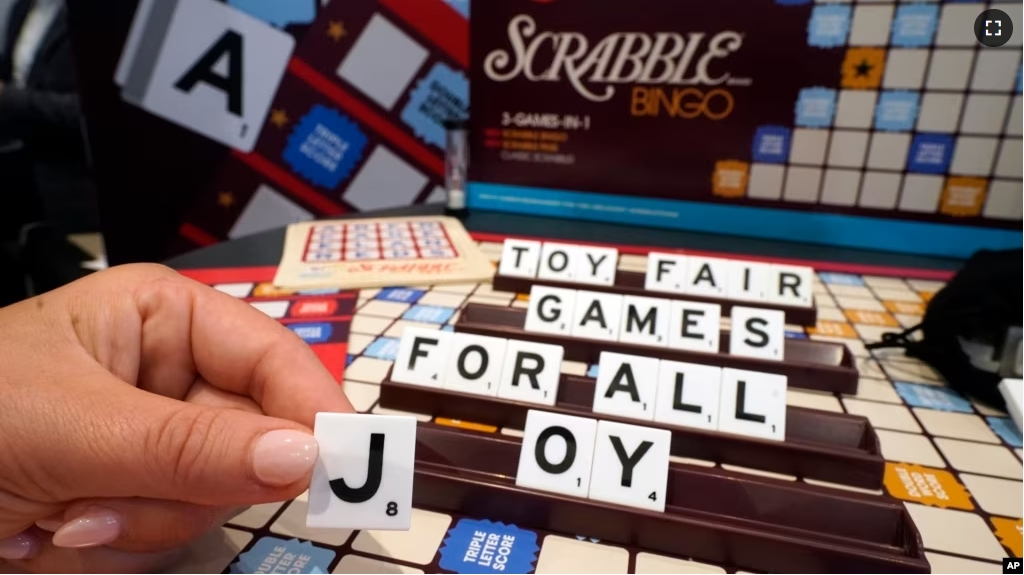 FILE - A Scrabble game with larger tiles is displayed at the 2023 Toy Fair, in New York's Javits Center, Monday, Oct. 2, 2023. (AP Photo/Richard Drew)