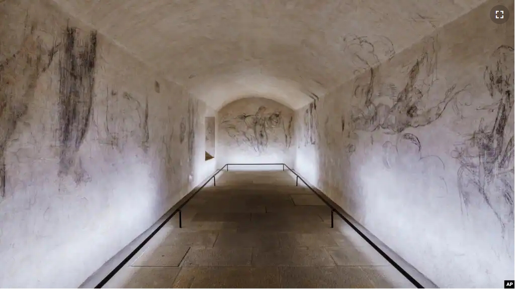 Delicate charcoal drawings that some experts have attributed to Michelangelo are seen on the walls of a room used to store coal until 1955 inside Florence's Medici Chapel, in central Italy, Tuesday, Oct. 31, 2023. (Francesco Fanfani via AP, HO)