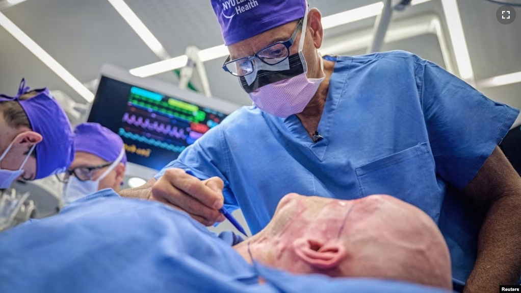 Dr. Eduardo D. Rodriguez prepares Aaron James of Hot Springs, Arkansas, for the world’s first whole-eye transplant as part of a partial face transplant at NYU Langone in New York City, U.S. May 27, 2023. (Joe Carotta/NYU Langone Health/Handout via REUTERS)