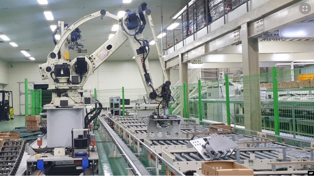 This photo provided by fire officials in Gyeongsangnam shows a vegetable packaging plant after a robot's deadly crush with a worker in Goseong, South Korea, Wednesday, Nov. 8, 2023. (South Korea Gyeongsangnam-do Fire Department via AP)