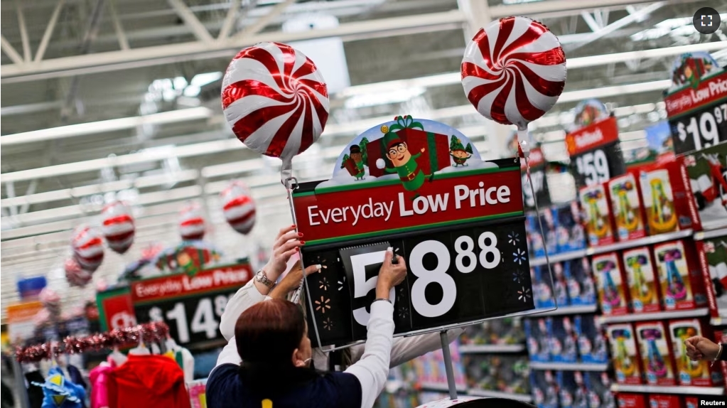 FILE - A Walmart worker organizes products for the Christmas season at a Walmart store in Teterboro, New Jersey, U.S. on October 26, 2016. (REUTERS/Eduardo Munoz//File Photo)