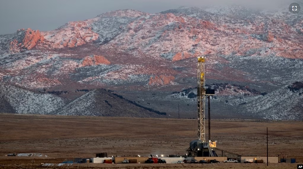 FILE - A drill rig stands at a Fervo Energy geothermal site under construction near Milford, Utah, Sunday, Nov. 26, 2023. In Nevada, Fervo’s first operational project has begun sending electricity to the state's grid to power Google data centers. (AP Photo/Ellen Schmidt)