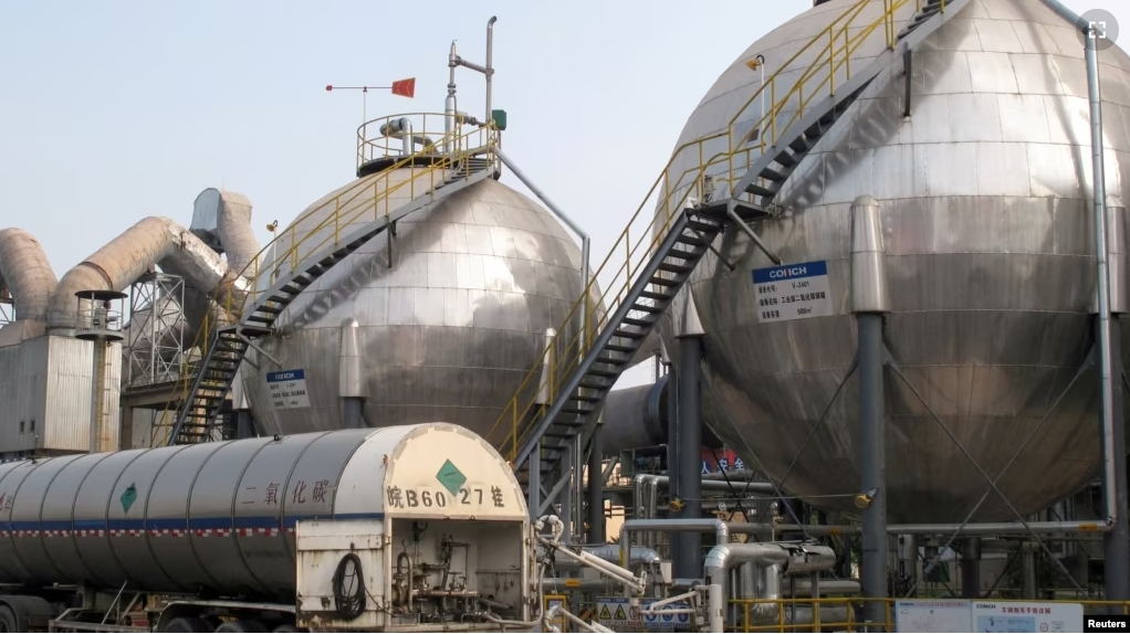 FILE - Carbon dioxide storage tanks are seen at a cement plant and carbon capture facility in Wuhu, Anhui province, China September 11, 2019. (REUTERS/David Stanway/File Photo)