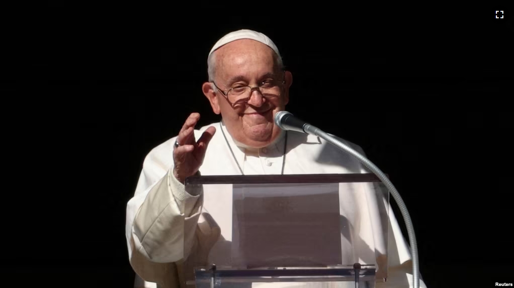 FILE - Pope Francis leads the Angelus prayer from his window, at the Vatican, Dec. 17, 2023. (REUTERS/Guglielmo Mangiapane/File Photo)