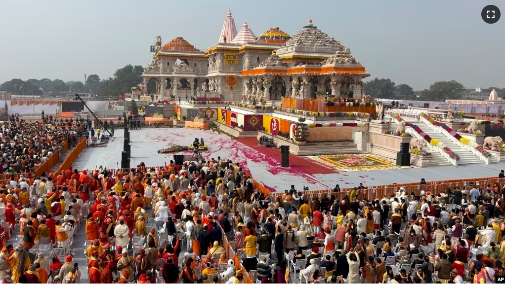 A general view of the audience during the opening of a temple dedicated to Hindu deity Lord Ram, in Ayodhya, India, Monday, January 22, 2024. (AP Photo/Rajesh Kumar Singh)