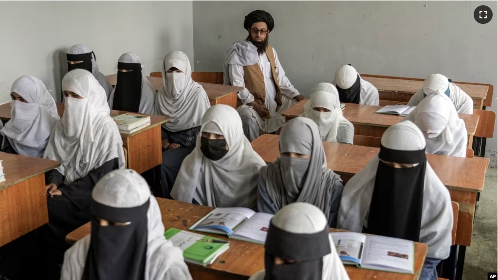 FILE - Afghan girls of all ages are permitted to study in religious schools, which are traditionally boys-only, a Taliban official said Thursday Dec. 21, 2023. (AP Photo/Ebrahim Noroozi, File)