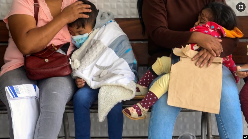 FILE - Children with dengue wait to be seen by doctors at the Mario Ortiz Children's Hospital in Santa Cruz, Bolivia, Feb. 16, 2023. (AP Photo/Ipa Ibanez,File)