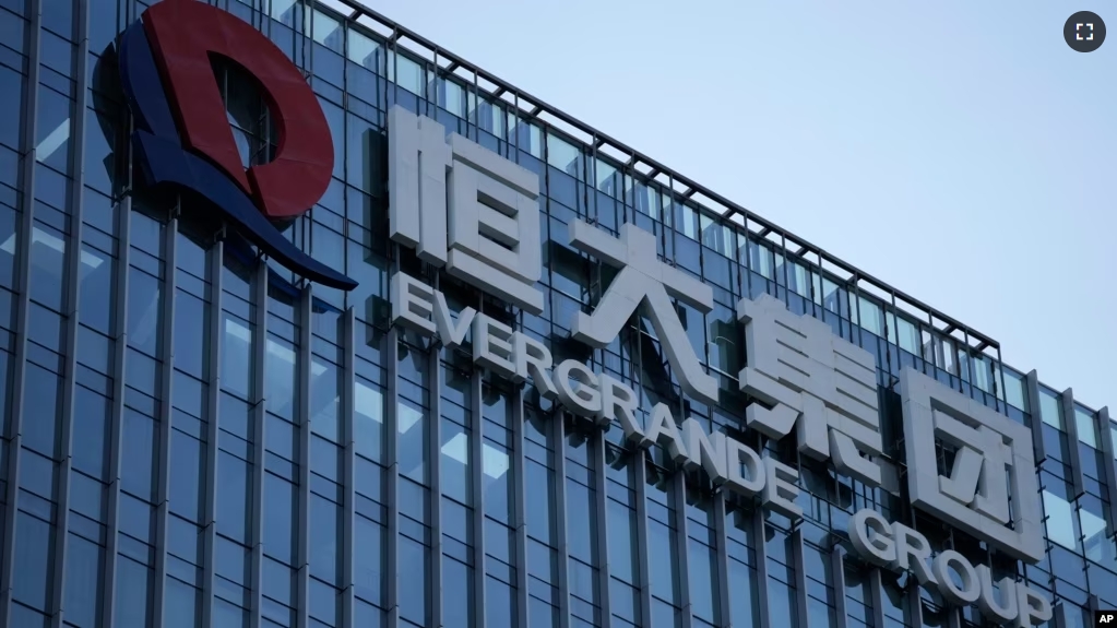 FILE - The Evergrande Group headquarters logo is seen in Shenzhen in southern China's Guangdong province, on Sept. 24, 2021. (AP Photo/Ng Han Guan, File)