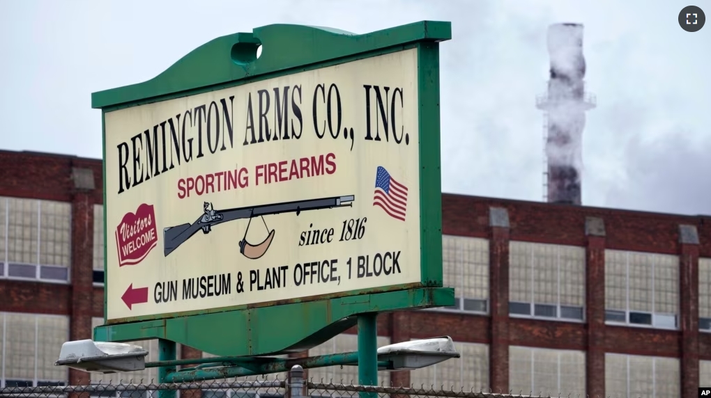 A sign for Remington Arms stands in front of the company's factory in Ilion, N.Y., Thursday, February. 1, 2024. (AP Photo/Seth Wenig)