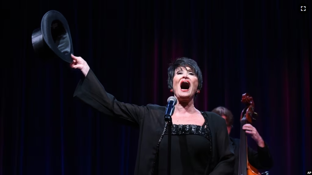 FILE - In this Aug. 2, 2015 file photo, Chita Rivera performs during the "Chita Rivera: A Lot of Livin' to Do" segment of the PBS 2015 Summer TCA Tour held at the Beverly Hilton Hotel in Beverly Hills, California. (Photo by Richard Shotwell/Invision/AP)