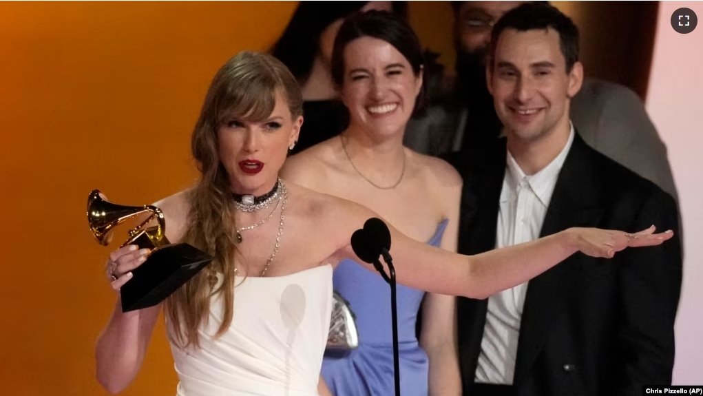 Taylor Swift accepts the award for album of the year for "MIdnights" during the 66th annual Grammy Awards on Sunday, Feb. 4, 2024, in Los Angeles. (AP Photo/Chris Pizzello)