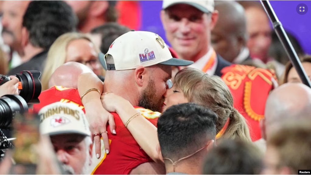 Travis Kelce kisses Taylor Swift after the Kansas City Chiefs' Super Bowl win on February 11, 2024. (Kyle Terada-USA TODAY Sports)