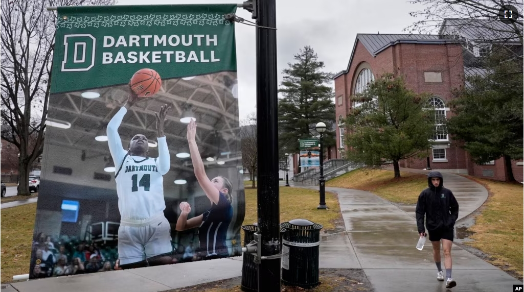 A student walks near the Alumni Gymnasium on the campus of Dartmouth College, Tuesday, March 5, 2024, in Hanover, N.H. (AP Photo/Robert F. Bukaty)