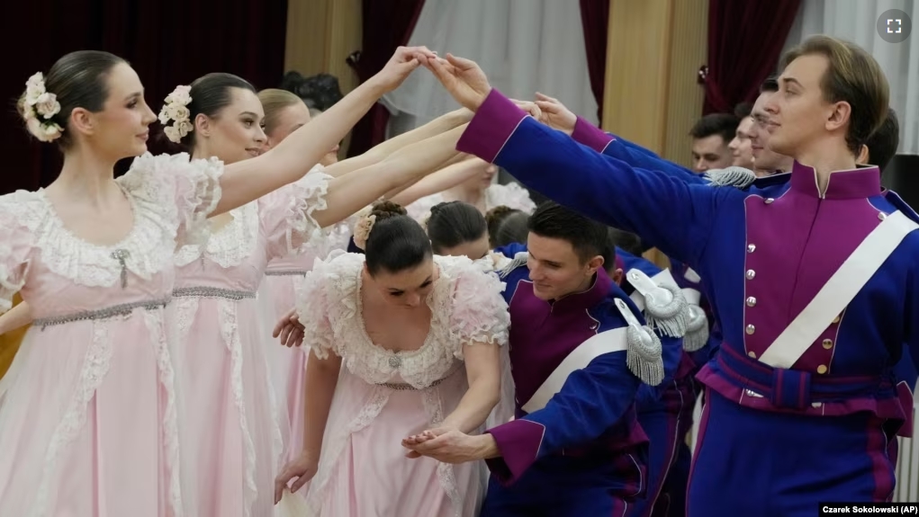 Dancers of the WARSZAWIANKA ensemble of the University of Warsaw dance Poland's national polonaise dance in 18th century costumes during dress rehearsal in Warsaw, Poland, on Feb. 8, 2024. (AP Photo/Czarek Sokolowski)