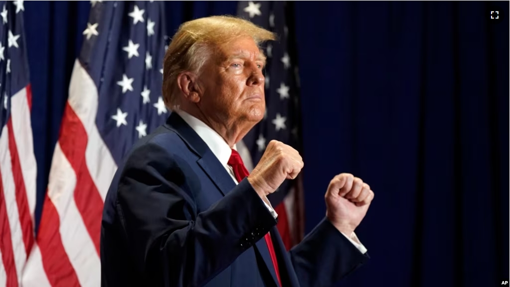 FILE - Republican presidential candidate former President Donald Trump gestures at a campaign rally, March 2, 2024, in Richmond, Va. The U.S. Supreme Court ruled that former President Donald Trump can stay on the 2024 presidential primary ballots. (AP Photo/Steve Helber, File)