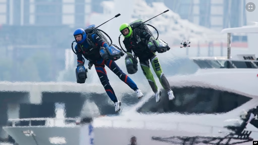 Jet suit pilots race in Dubai, United Arab Emirates, Wednesday, Feb. 28, 2024. Dubai on Wednesday hosted what it called its first-ever jet suit race. (AP Photo/Jon Gambrell)