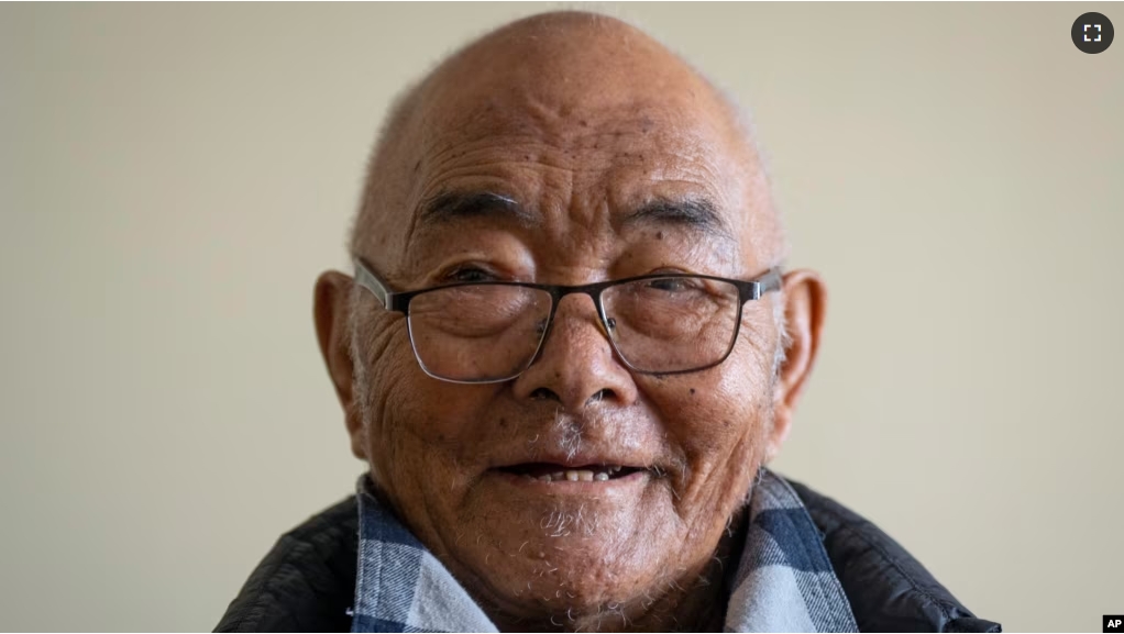 Kanchha Sherpa speaks to Associated Press during an interview at his home in Kathmandu, Nepal, Saturday, March 2, 2024. (AP Photo/Niranjan Shrestha)