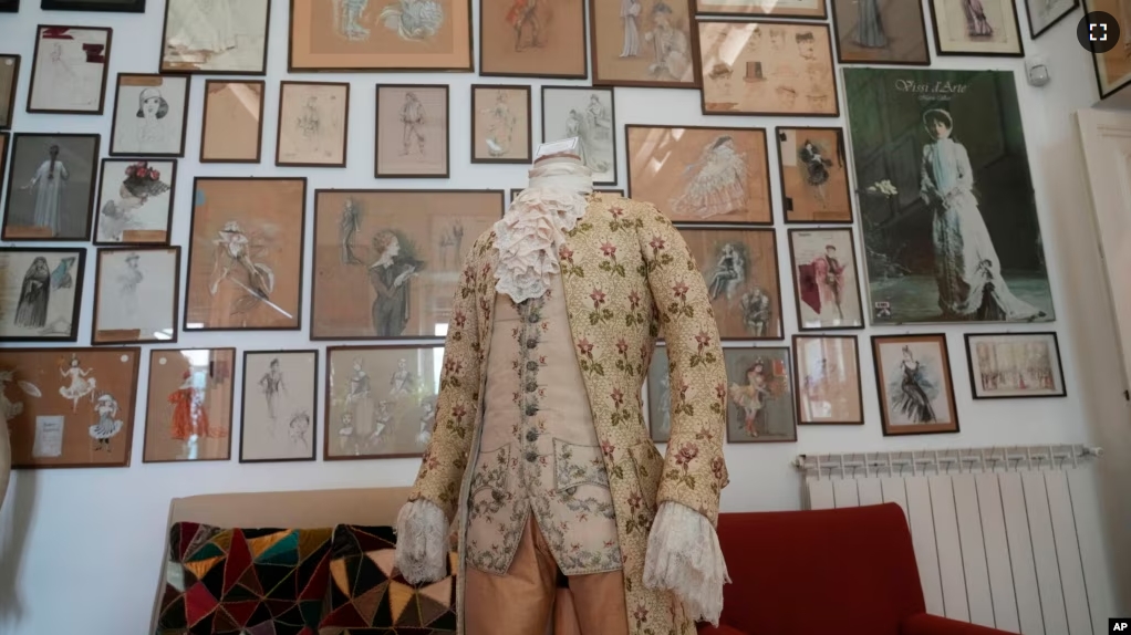The Amadeus dress by Milos Forman is displayed at the Tirelli Atelier in Rome, Tuesday, March 5, 2024. (AP Photo/Gregorio Borgia)