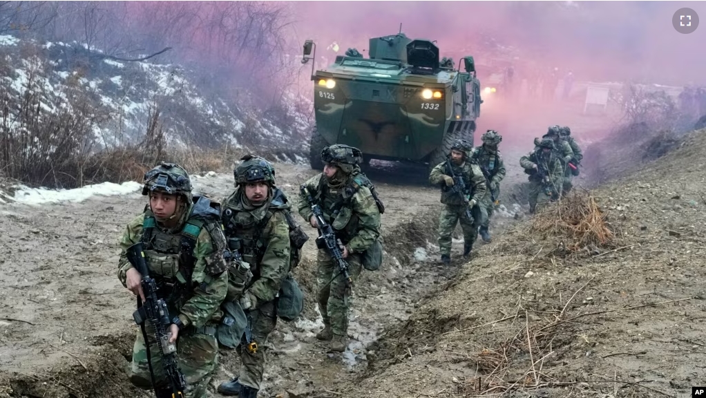 FILE - U.S. Army soldiers march during a joint military drill of South Korea and the United States in Paju, South Korea, Friday, Jan. 13, 2023. (AP Photo/Ahn Young-joon)