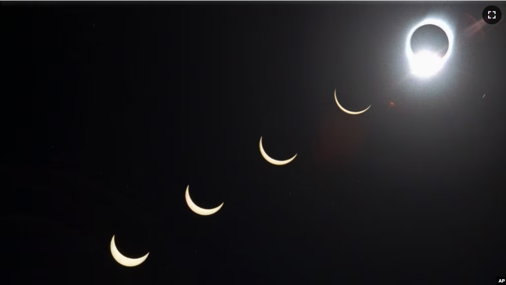 The progression of a total solar eclipse is seen with the moon passing in front of the sun above Siem Reap in northwestern Cambodia, on Tuesday, Oct. 24, 1995. (AP Photo/Richard Vogel, File)