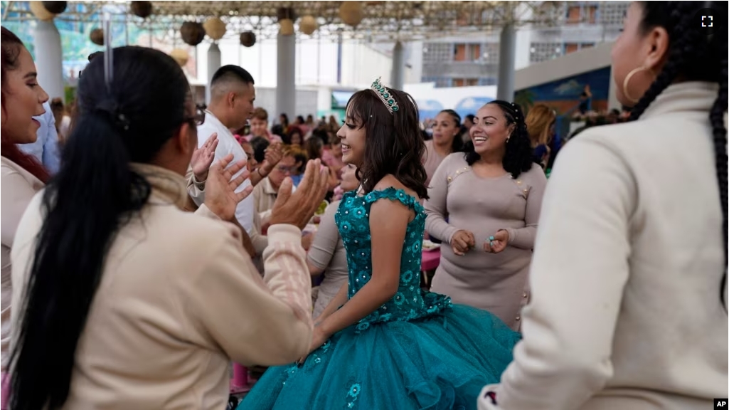 FILE - Daughters of imprisoned women celebrate their 15th birthday, a tradition called quinceanera, at the San Marta Acatitla rehabilitation in the Iztapalapa neighborhood of Mexico City, Friday, Aug. 18, 2023. (AP Photo/Arnulfo Franco)