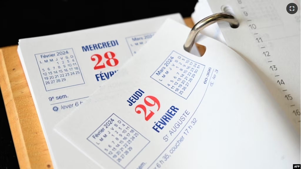 This photograph taken in Paris on February 26, 2024, shows the tear-off calendar page for the February 29 leap year 2024. (Photo by Martin BUREAU / AFP)