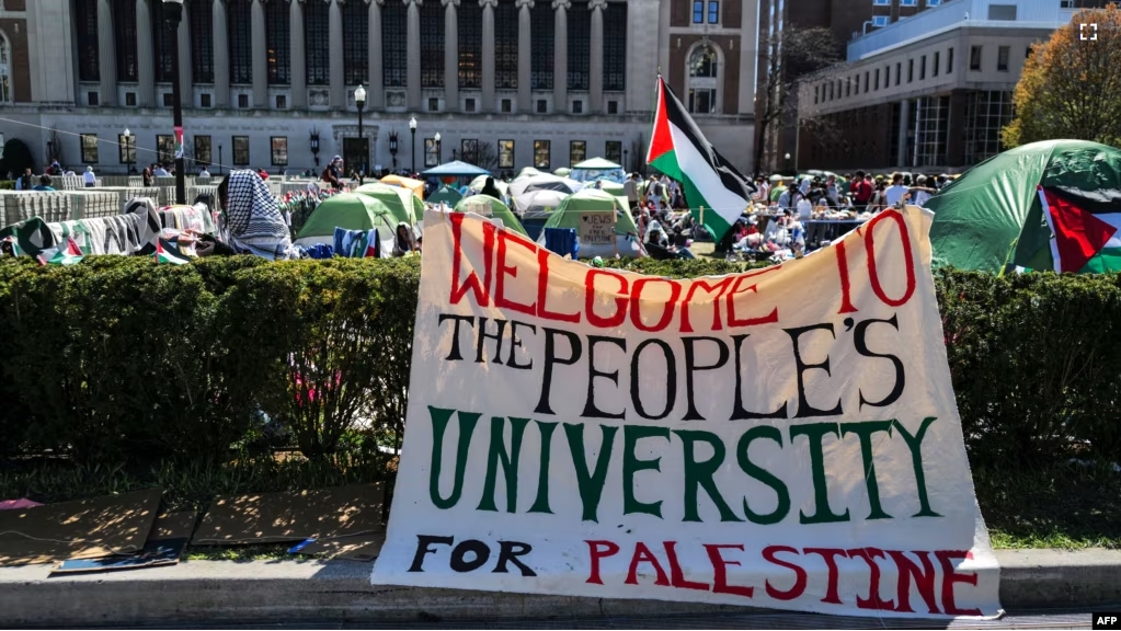Pro-Palestinian activists demonstrate on the campus of Columbia University in New York City on April 22, 2024. (Photo by Charly TRIBALLEAU / AFP)
