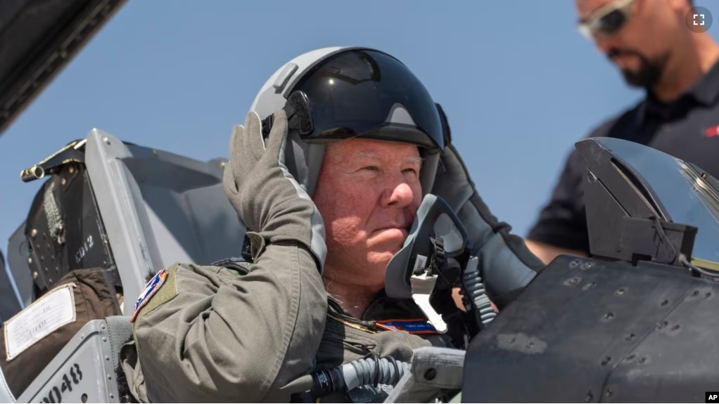 Air Force Secretary Frank Kendall in the cockpit of an X-62A VISTA at Edwards Air Force Base, Calif., on May 2, 2024. The AI-controlled plane flew Kendall in maneuvers that put 5Gs of pressure on his body at speeds exceeding 550 miles an hour. (AP Photo/Damian Dovarganes)