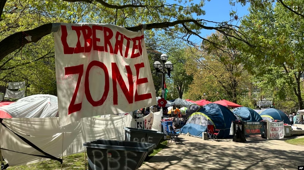 FILE - Dozens of tents were in place as part of a pro-Palestinian protest at the University of Michigan in Ann Arbor, Mich., on Thursday, May 2, 2024. (AP Photo/Ed White)