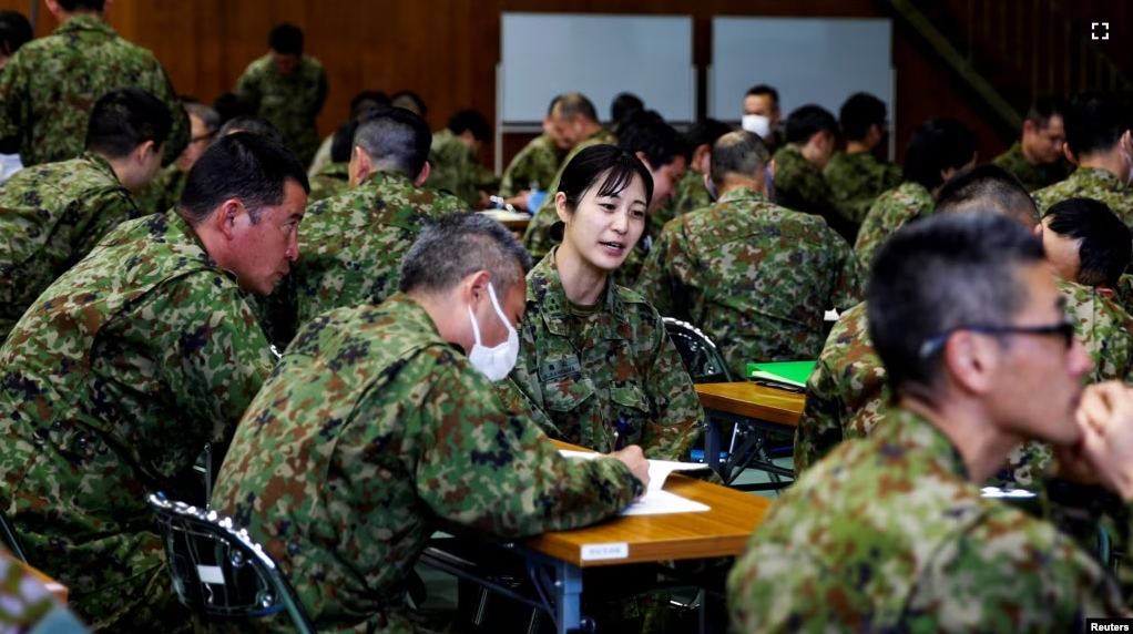 Japan Ground Self-Defence Force (JGSDF) soldiers participate in a seminar to prevent harassment at JGSDF Camp Asaka, in Tokyo, Japan April 16, 2024. (REUTERS/Sakura Murakami)