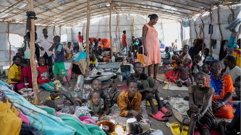 South Sudanese shelter in a transit center in Renk, South Sudan Wednesday, May 17, 2023. (AP Photo/Sam Mednick)