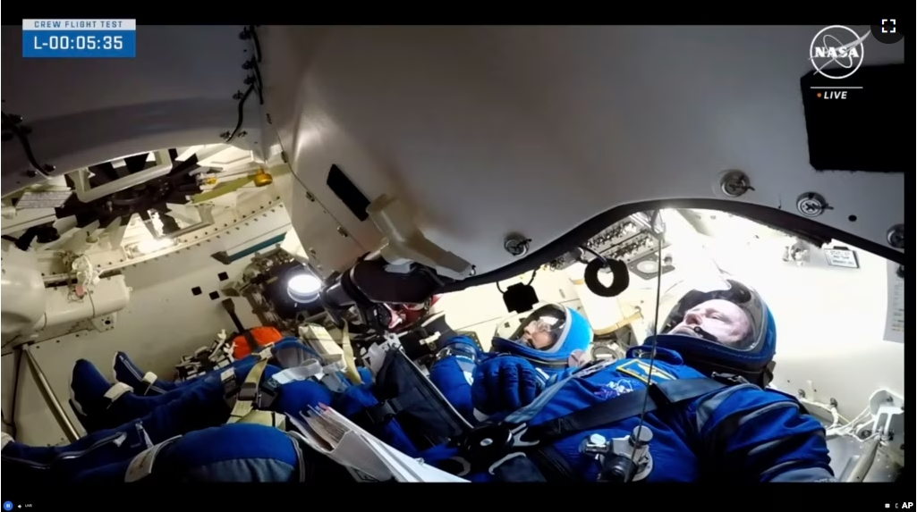 NASA astronauts Butch Wilmore, right and Suni Williams wait for liftoff inside the Boeing Starliner capsule at Space Launch Complex 41 Wednesday, June 5, 2024, in Cape Canaveral, Fla. (NASA via AP)