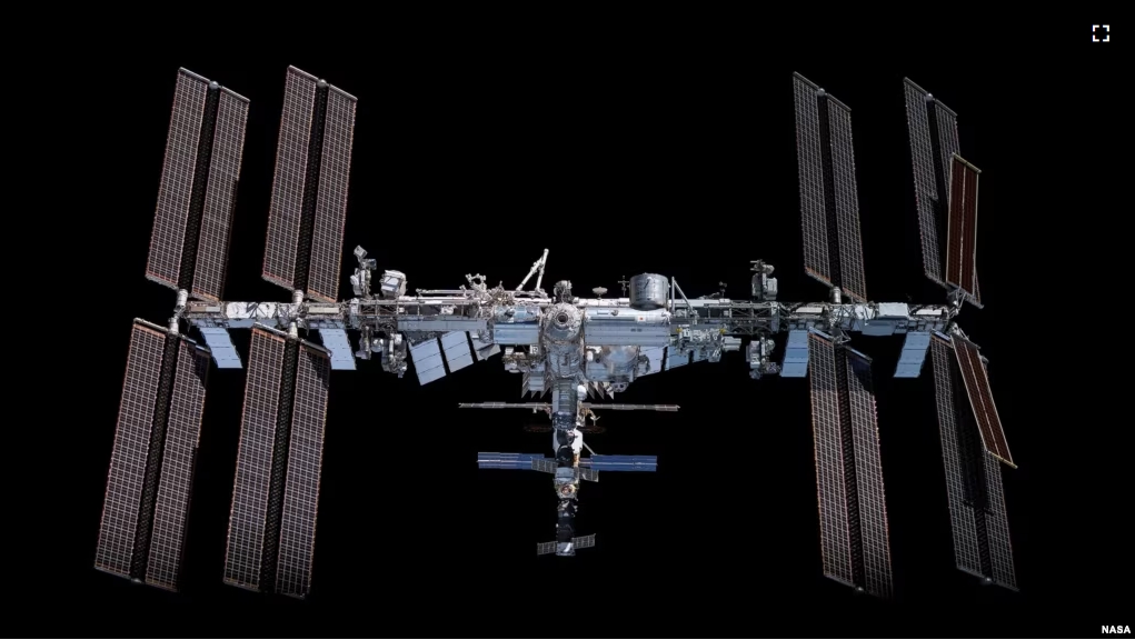 This image depicts the International Space Station pictured from the SpaceX Crew Dragon Endeavour during a fly around of the orbiting lab. (Image Credit: NASA)