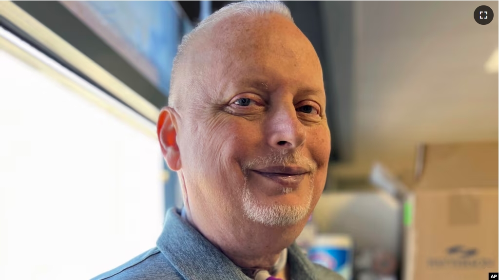 In this photo provided by the Mayo Clinic, Marty Kedian poses for a photo in Mayo Clinic’s Head and Neck Regenerative Medicine Laboratory in Scottsdale, Ariz., on June 12, 2024. (Mayo Clinic via AP)