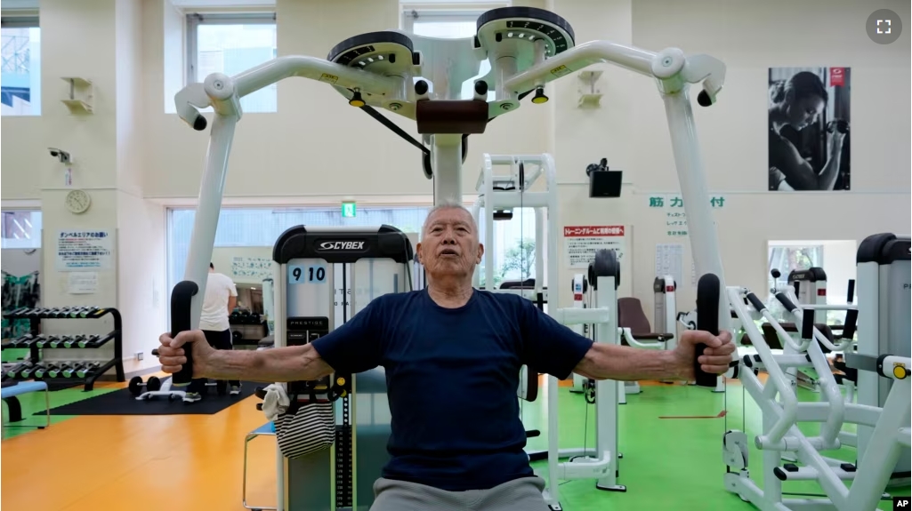 Shigeo Takahashi, 83, uses a weight machine as he works out at the Fukagawa Sports Center in Tokyo, June 12, 2024. Experts say that as we age, weight-resistance training might deliver unexpected benefits. (AP Photo/Hiro Komae)