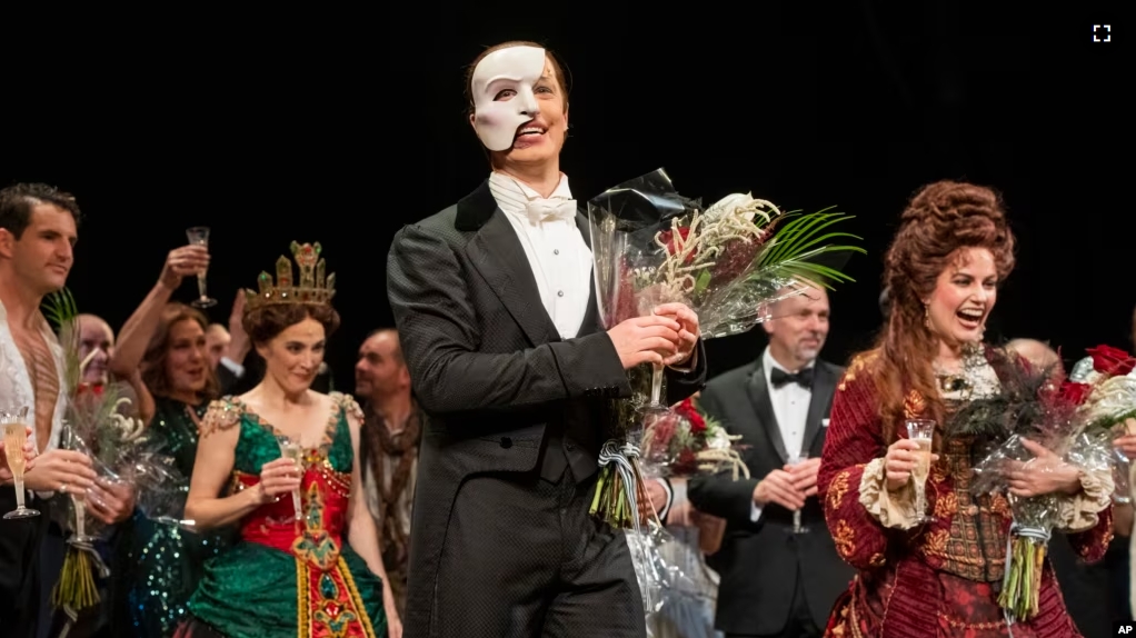 FILE - Member of the cast of "The Phantom of the Opera" appear at the end (called a "curtain call") of the final Broadway performance at the Majestic Theatre on April 16, 2023, in New York City. (Photo by Charles Sykes/Invision/AP)